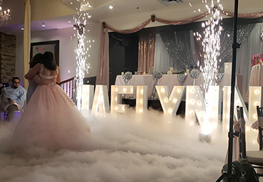 Quinceanera Dancing on a Cloud and With Cold Sparklers